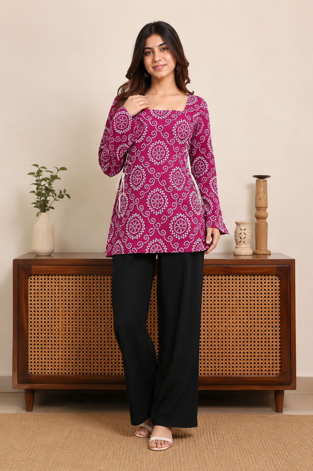 Elegant magenta printed kurti with stylish side lace-up detailing, flared sleeves and a comfortable straight silhouette